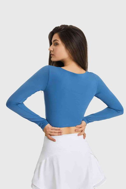 Millennia Cutout Long Sleeve Cropped Sports Top - FitFemme.Shop
