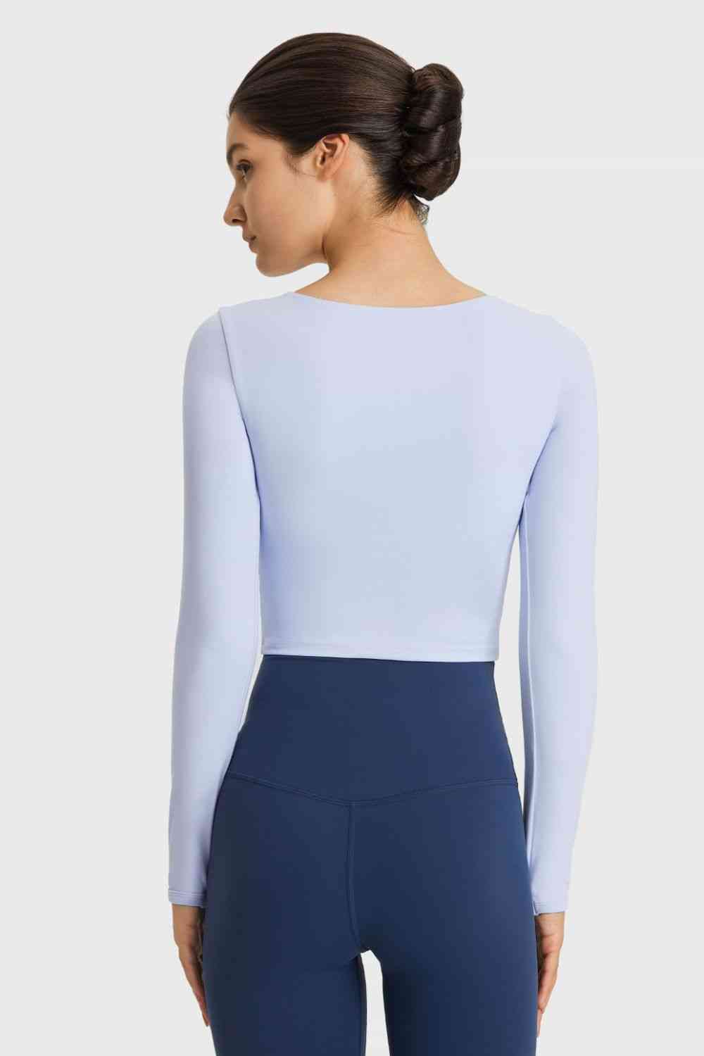 Millennia Cutout Long Sleeve Cropped Sports Top - FitFemme.Shop
