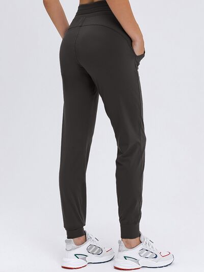 Millennia Double Take Tied Joggers with Pockets - FitFemme.Shop