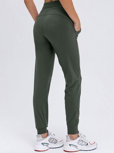 Millennia Double Take Tied Joggers with Pockets - FitFemme.Shop