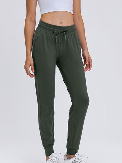 Millennia Double Take Tied Joggers with Pockets - FitFemme.Shop