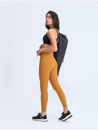 Millennia Wide Waistband Leggings with Pockets - FitFemme.Shop
